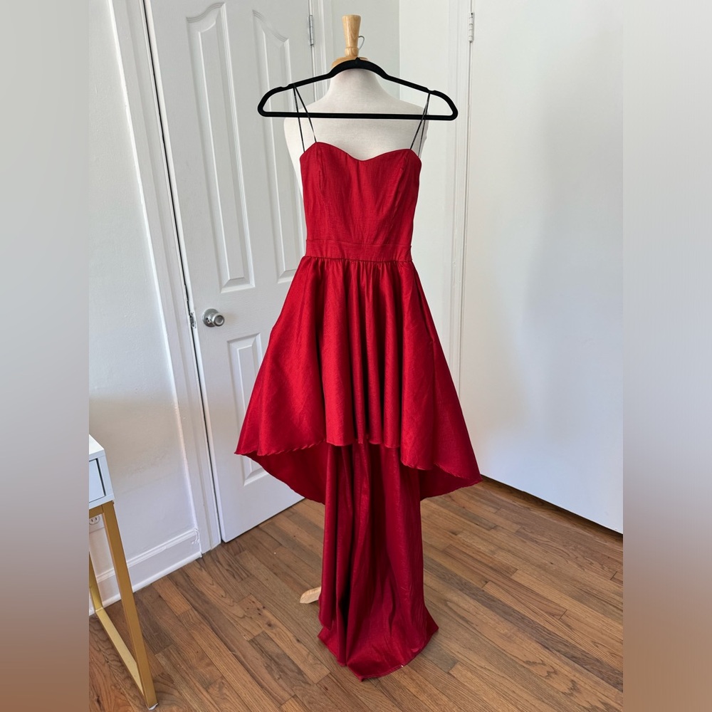 Stretch red high low strapless gown